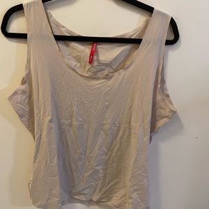 Spanx size 2X sliming tank designed for smoothing the belly and back